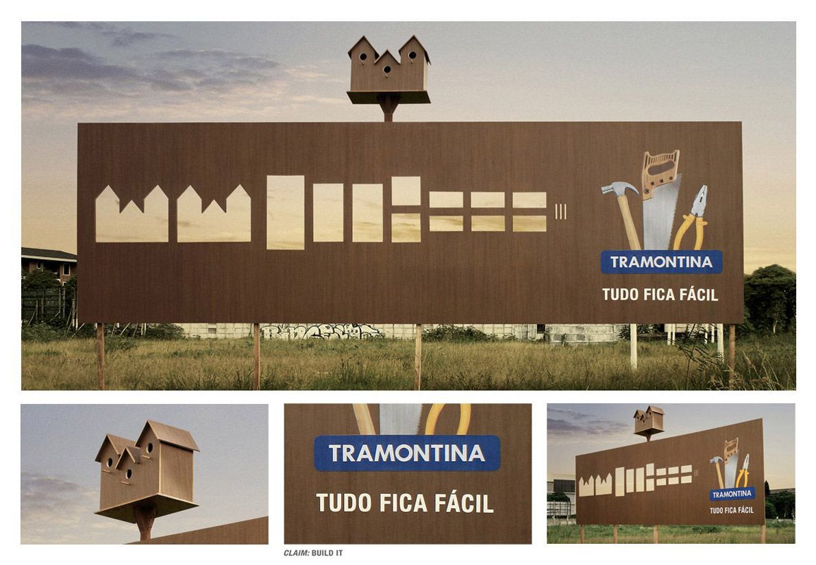 Banner: Billboard with birdhouse parts cut out of it, assembled birdhouse on top