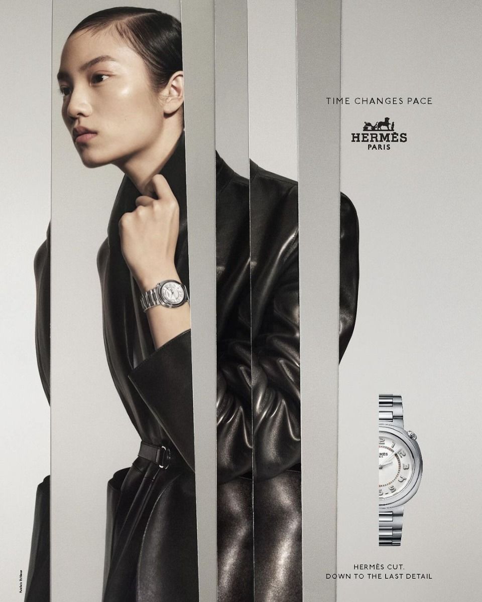 Instagram post: Model in black leather coat seen through vertical mirror slices wearing a steel watch