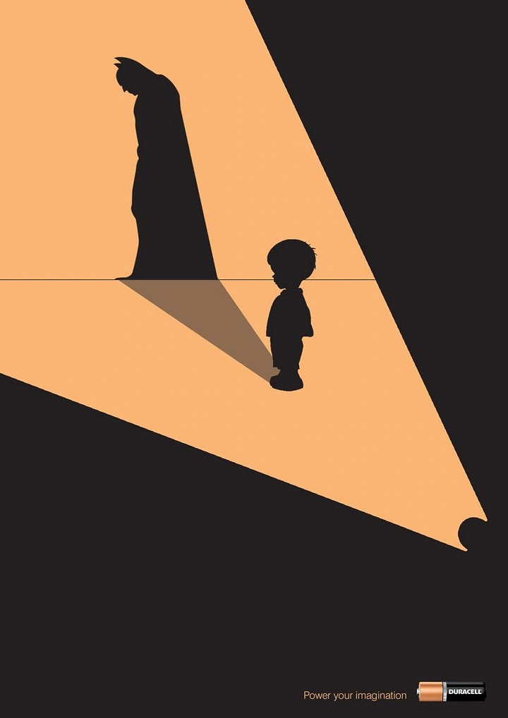 Batteries & Inverters creative ad: Child's torchlit shadow becomes a caped superhero