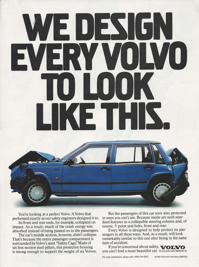 Blue sedan with crumpled front and rear