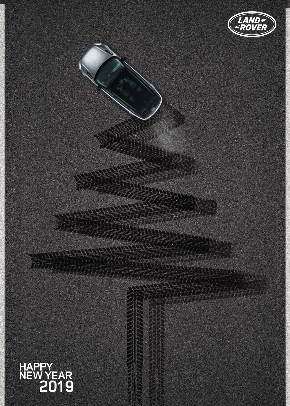 Top-down SUV drawing a zigzag Christmas tree with tyre tracks