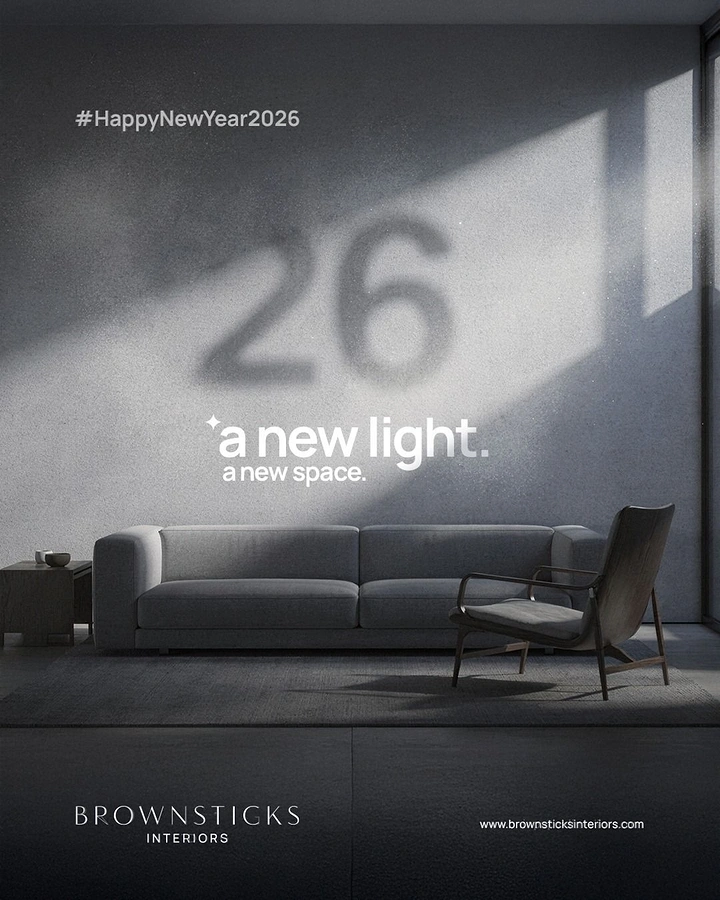 New Year creative ad: Minimal living room with 26 cast in light on the wall