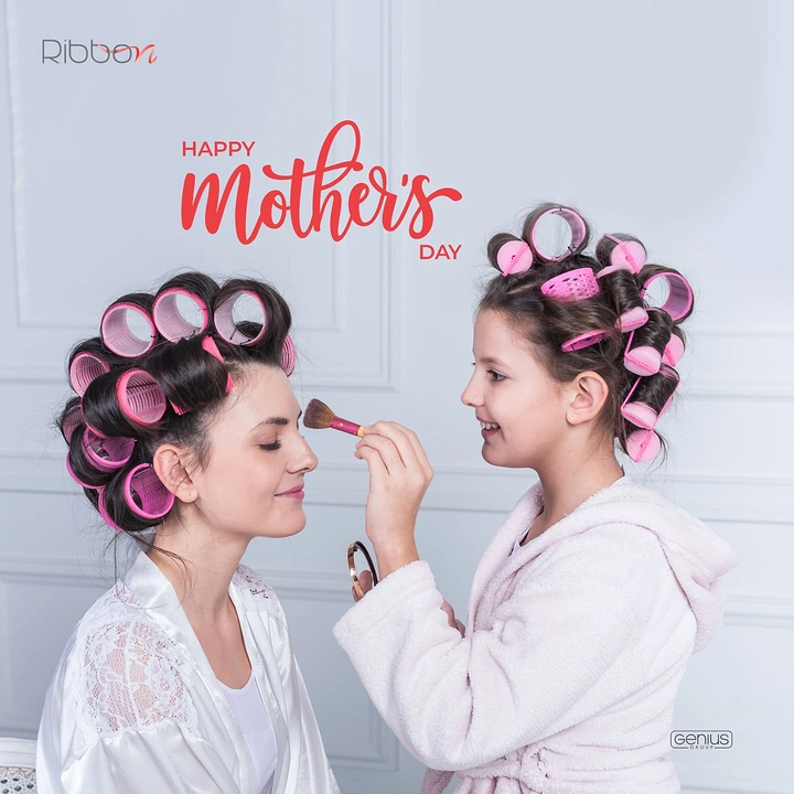 Mother's Day creative ad: Mother and daughter in pink hair rollers, daughter applying makeup to mom