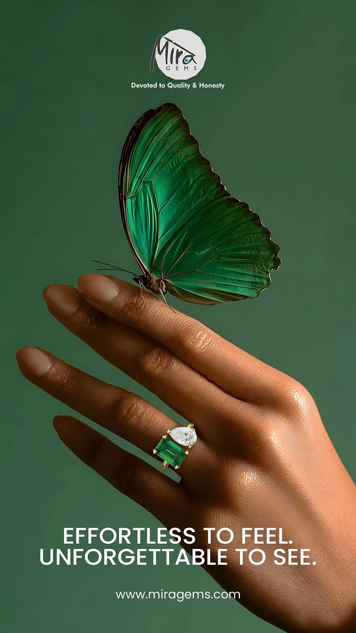 Creative ad: Hand wearing an emerald and diamond ring with a green butterfly perched on a fingertip