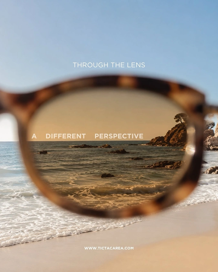 Creative ad: Close-up of a tortoiseshell sunglass lens framing a warm-tinted beach scene