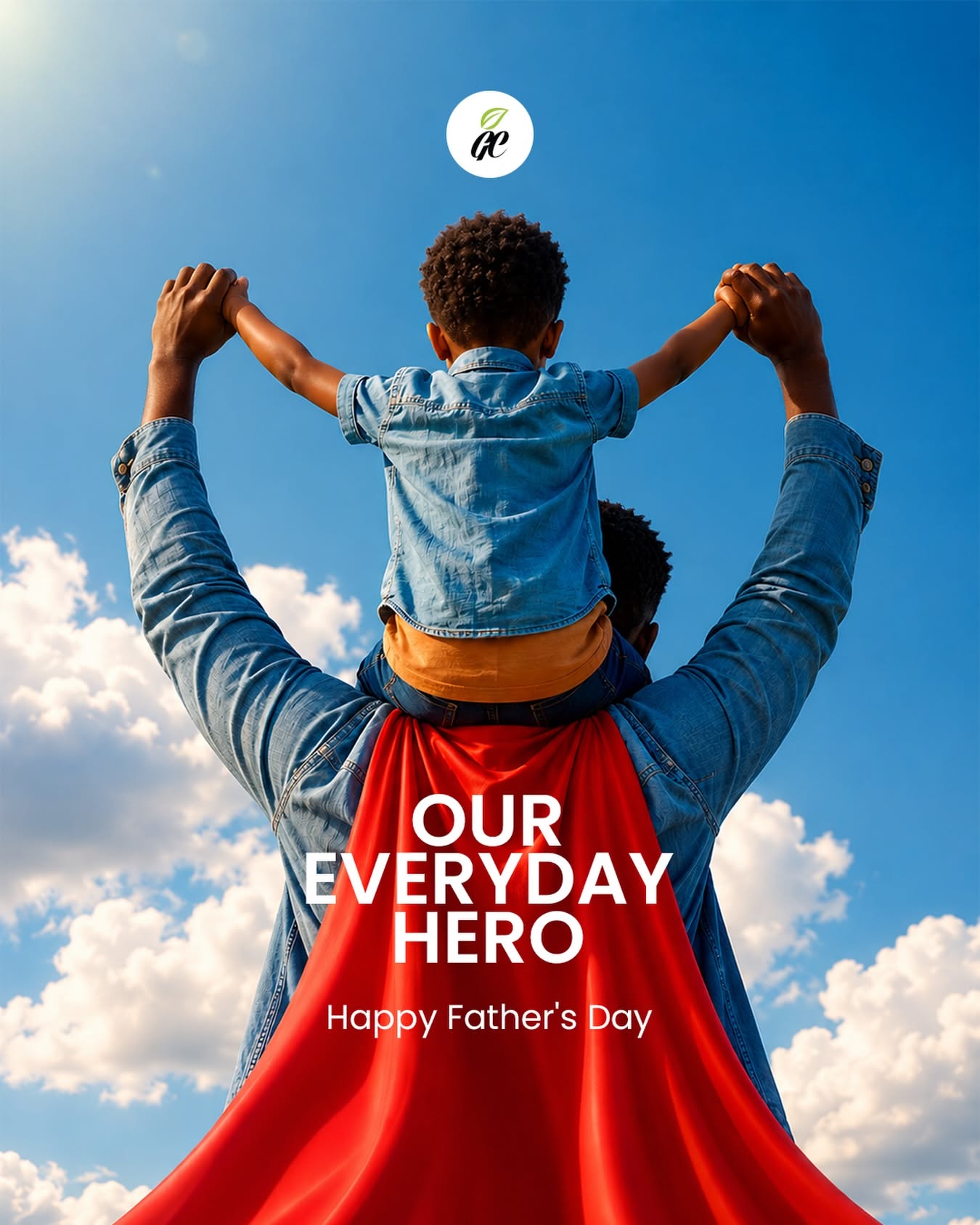 Father in red cape carrying child on shoulders, seen from behind
