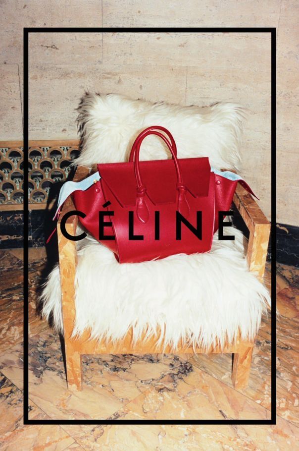 Poster: Red leather tote on a fur-draped wooden chair
