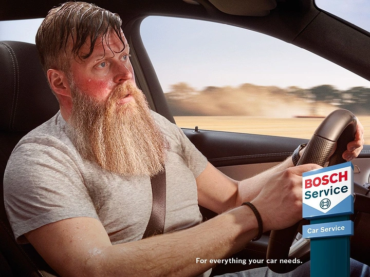 Auto Repair & Garages creative ad: Overgrown beard implies endless service wait
