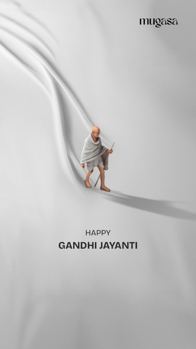 Miniature 3D Gandhi figure walking along a fold of white fabric