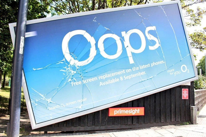 Telecom creative ad: Tilted billboard printed with a cracked-screen effect