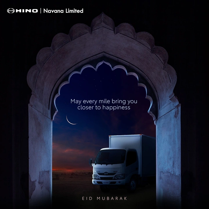 Eid creative ad: Light truck framed by an ornate stone arch at dusk