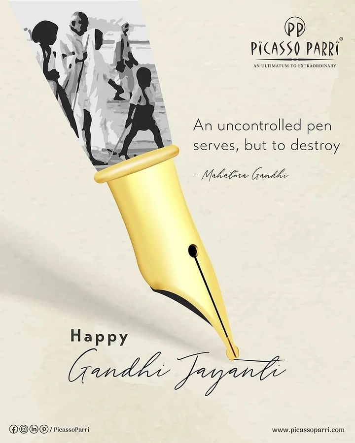 Gandhi Jayanti creative ad: Gold fountain pen whose barrel is a monochrome historic march photo