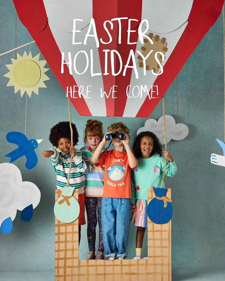 Kids Clothing creative ad: Kids in paper-craft hot air balloon