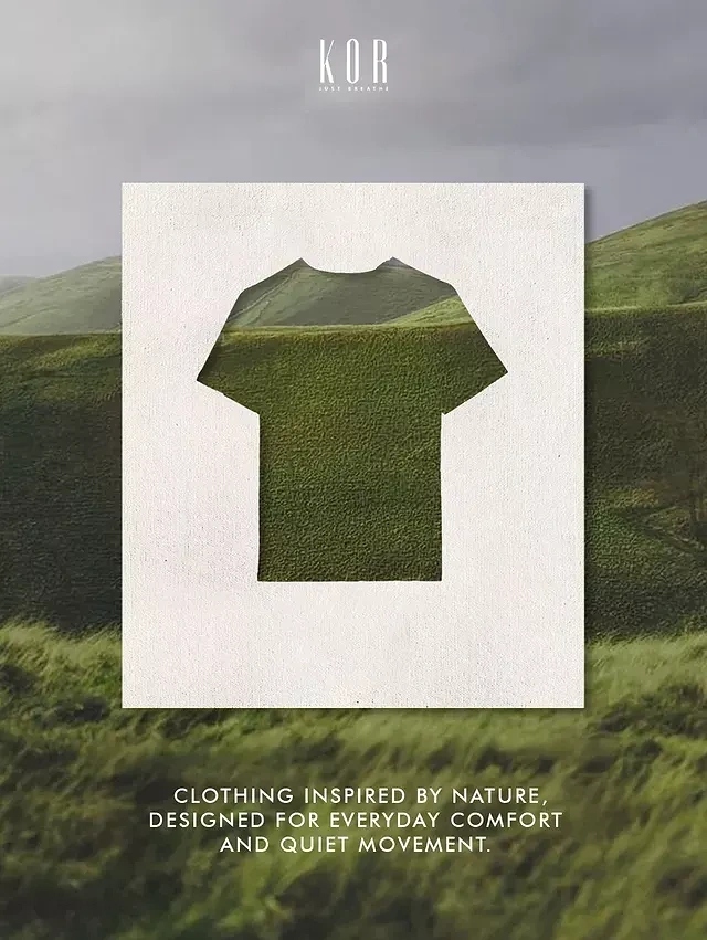 Creative ad: T-shirt-shaped cutout in paper revealing grassy hills