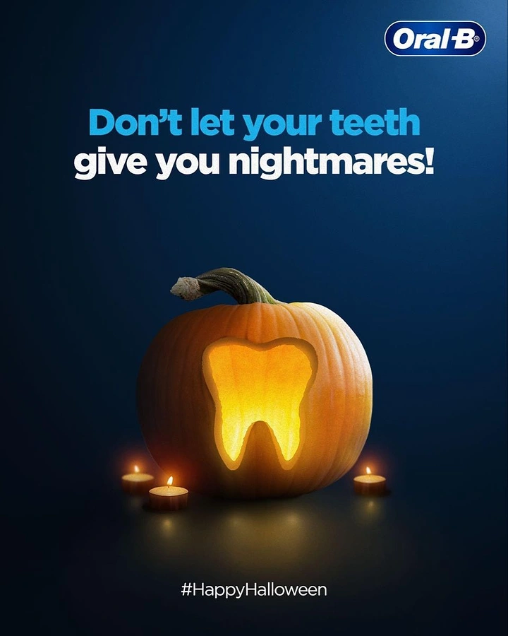 Halloween creative ad: Pumpkin carved with a glowing tooth shape