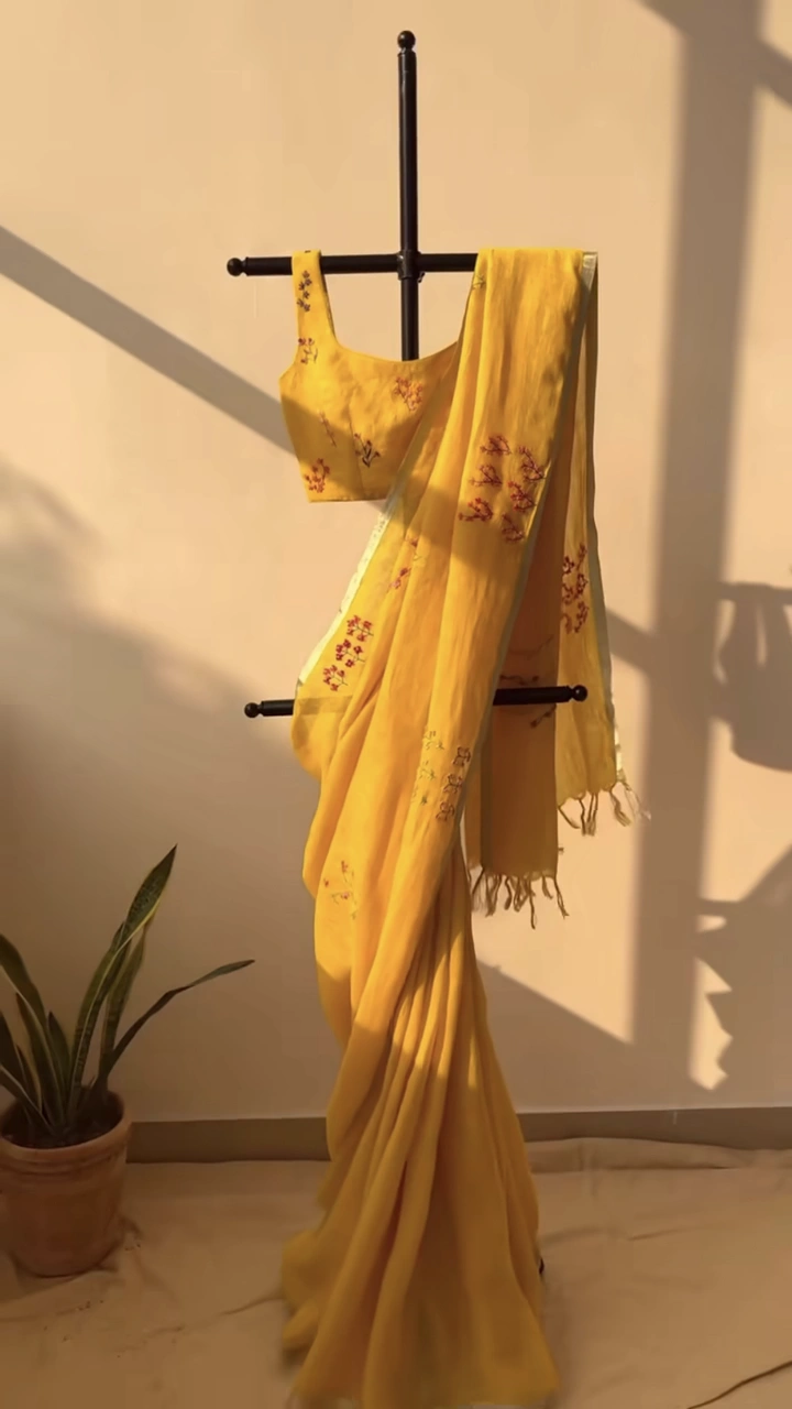 Ethnic Wear & Sarees creative ad: Saree on stand forms absent wearer