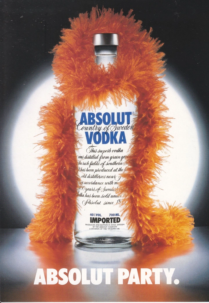 Creative ad: Vodka bottle wrapped in orange feather boa