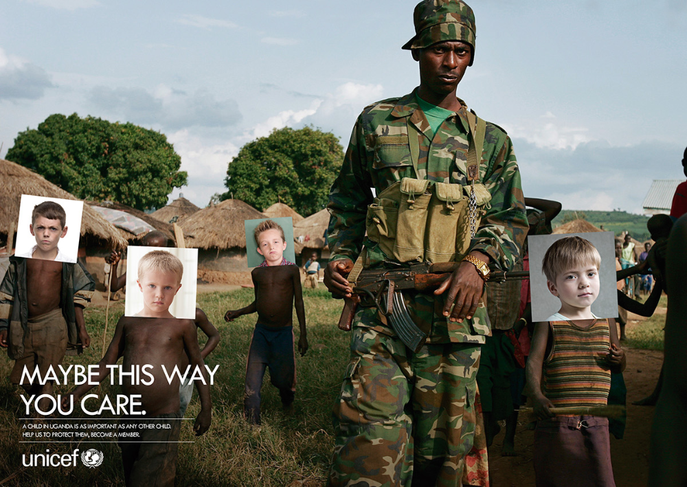 Poster: Armed soldier leading African children whose faces are covered by printed photos of white children