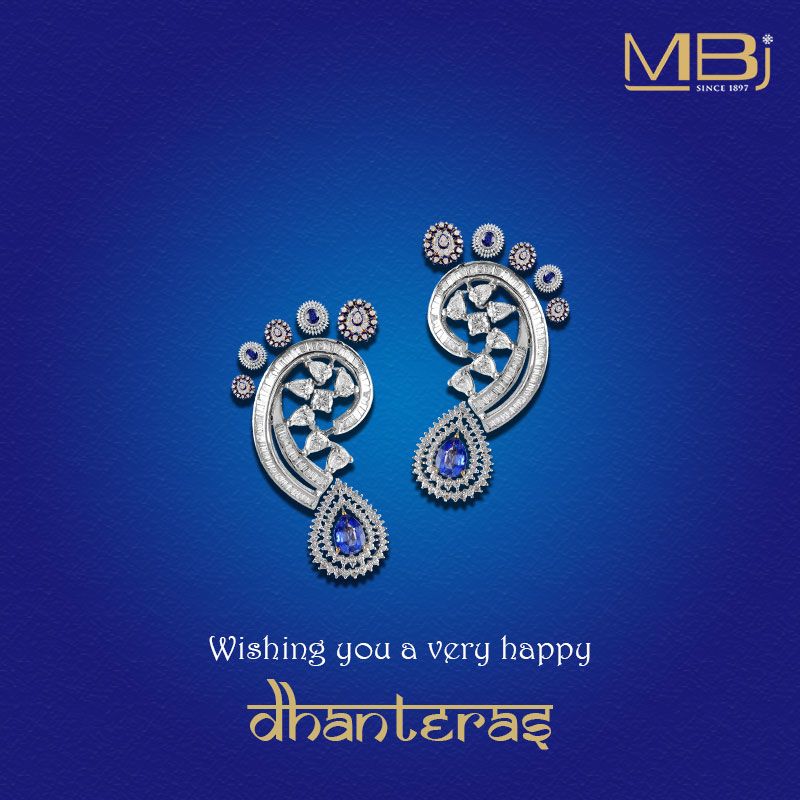 Pair of diamond-and-sapphire earrings shaped like Lakshmi's footprints