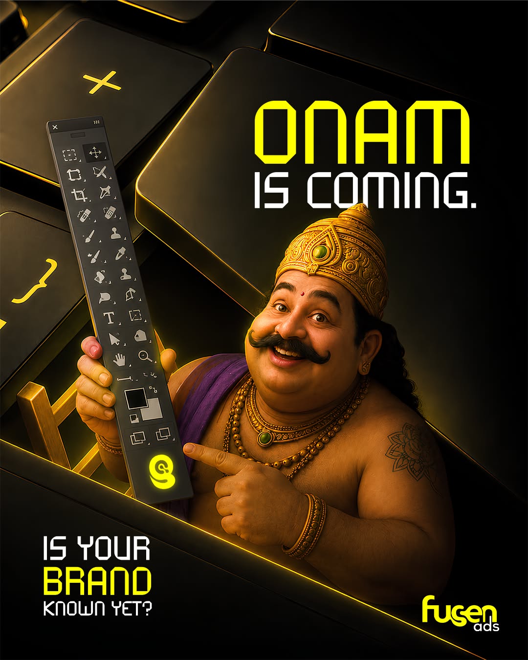 Mahabali popping out of a keyboard holding a design toolbar