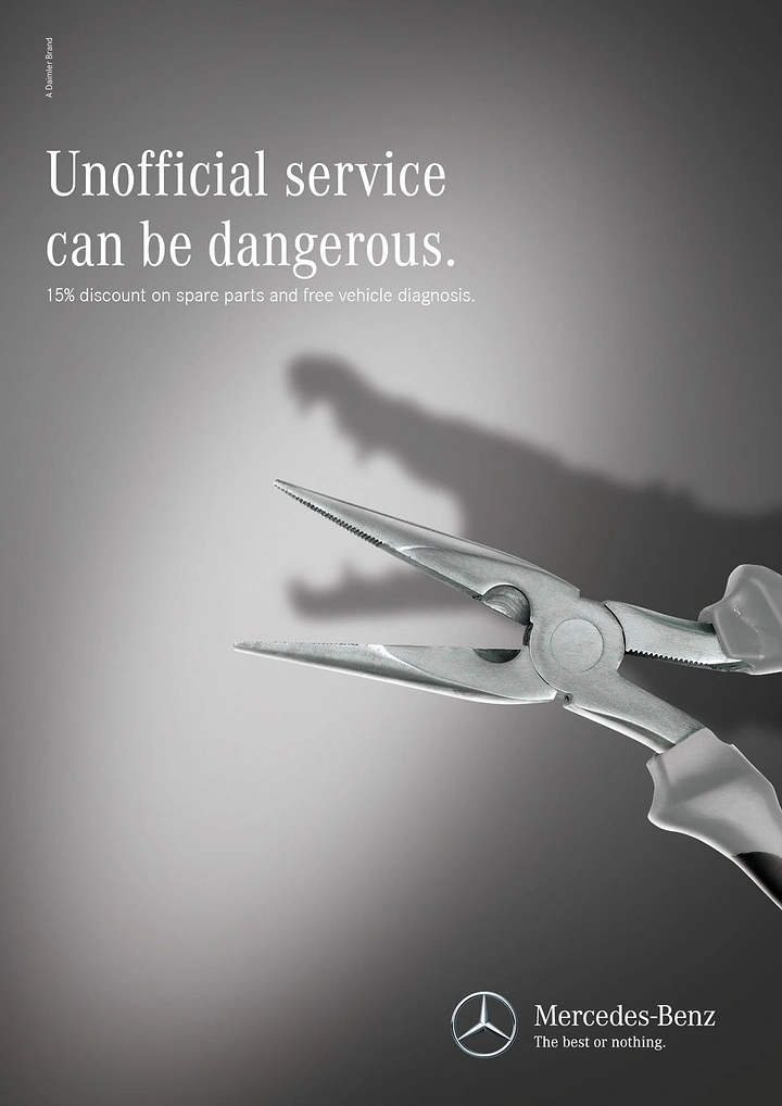 Automotive creative ad: Pliers casting a crocodile-jaw shadow