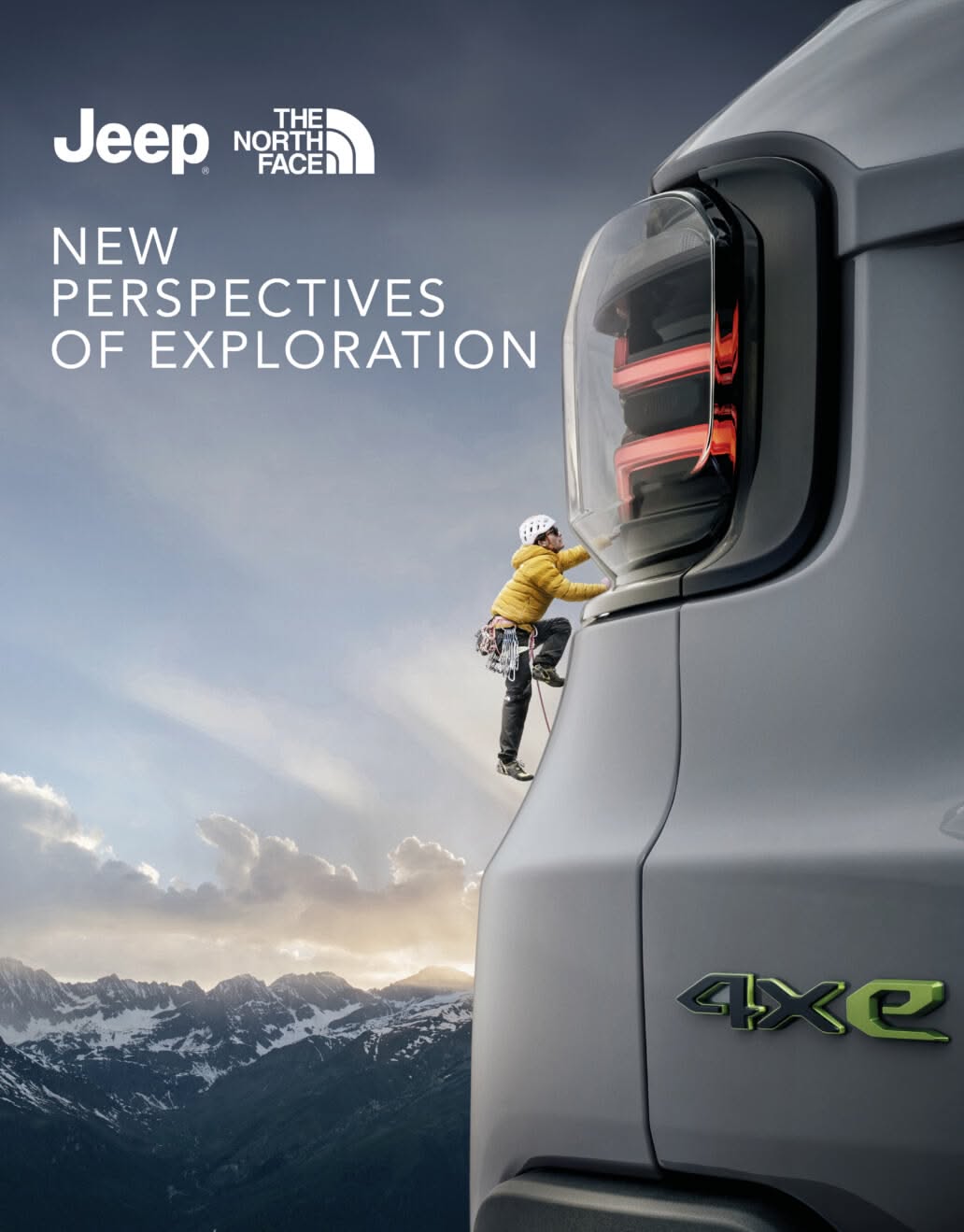 Instagram post: Tiny climber scaling the rear flank of a giant grey SUV like a cliff