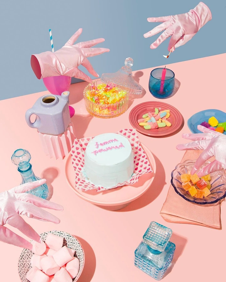Balloon & Party Decorators creative ad: Surreal floating-hands party tableau