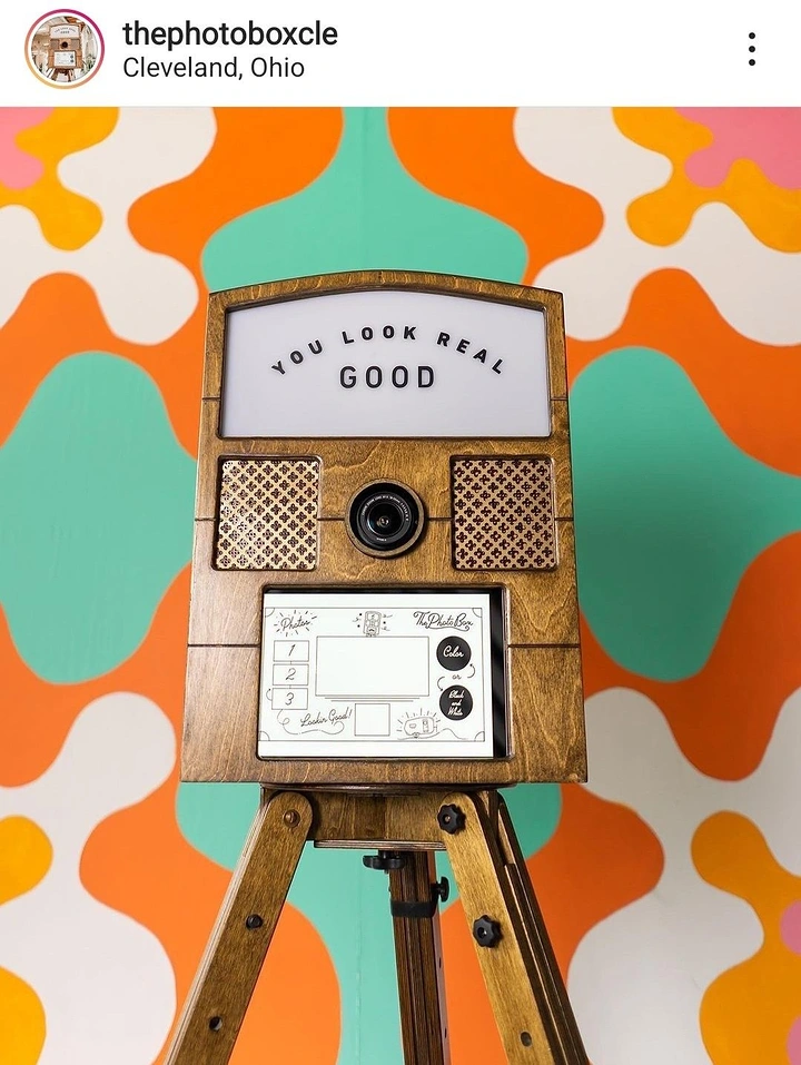 Photo Booth Rentals creative ad: Retro camera composition reinforces flattering copy