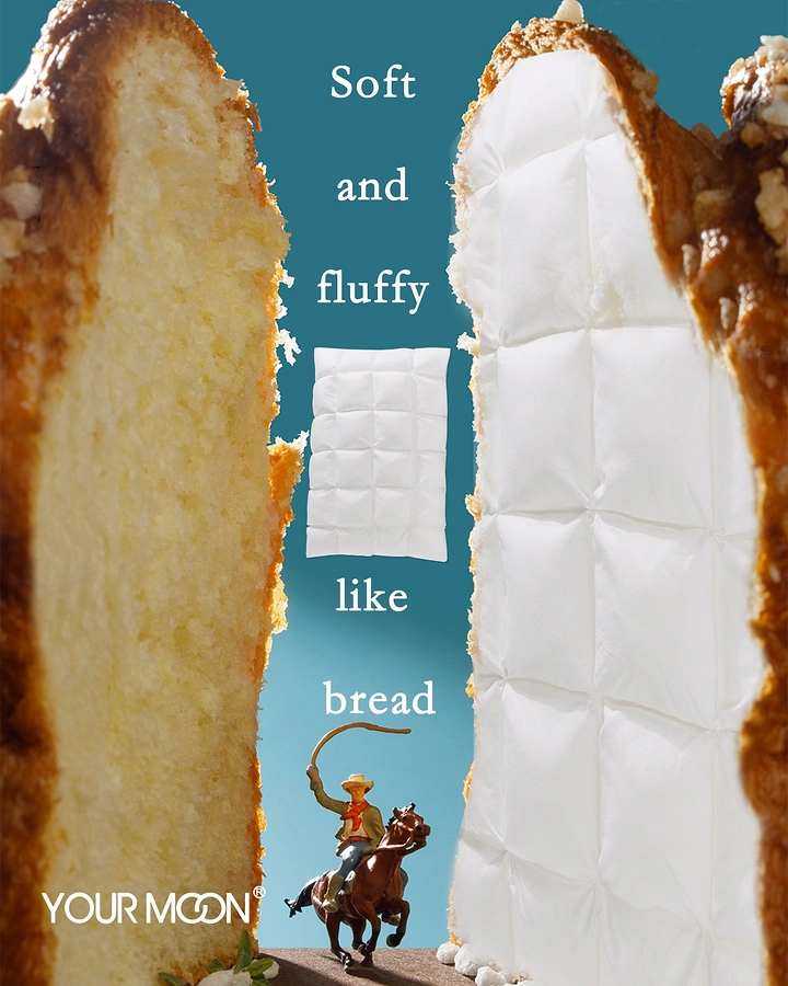 Mattress & Bedding creative ad: Giant bread slices as canyon walls, one textured like a quilted duvet, with a miniature cowboy