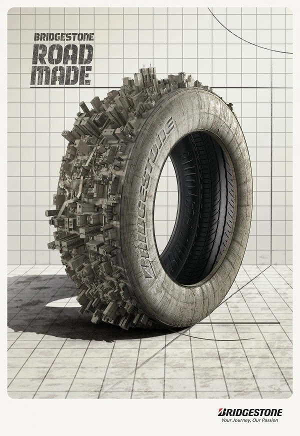 Automotive creative ad: Tyre whose tread is formed from a dense miniature cityscape