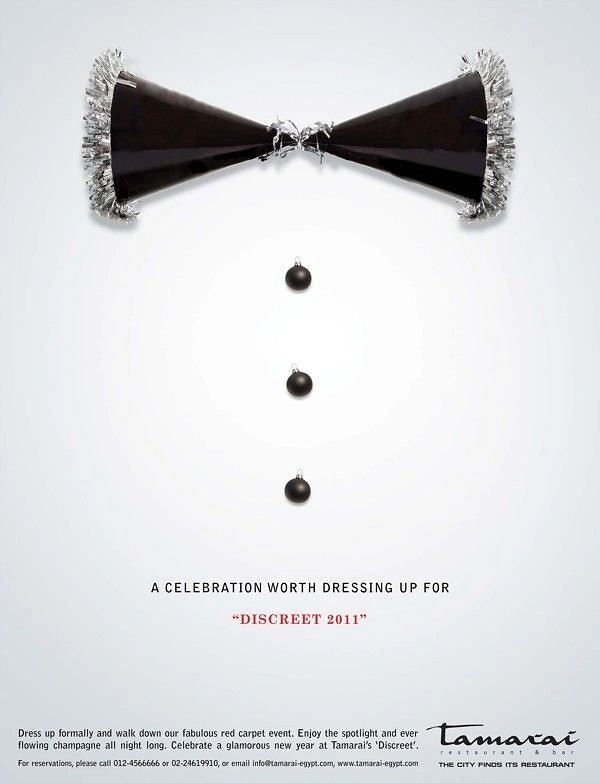Restaurant & Cafe creative ad: Party hats forming a bow tie with bauble buttons