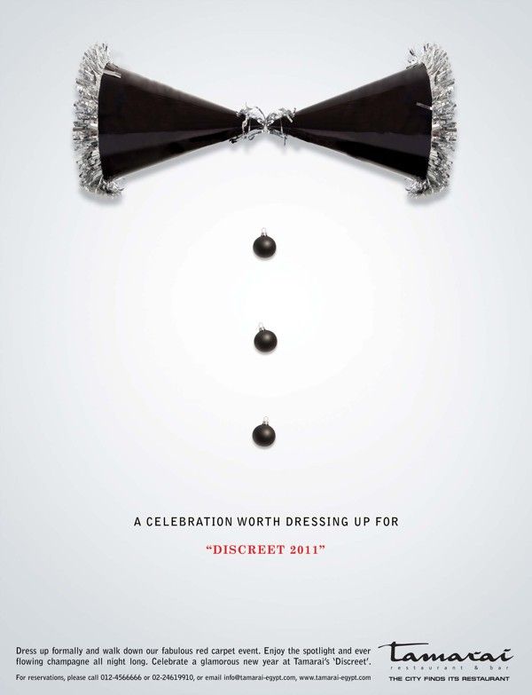 Party hats forming a bow tie with bauble buttons