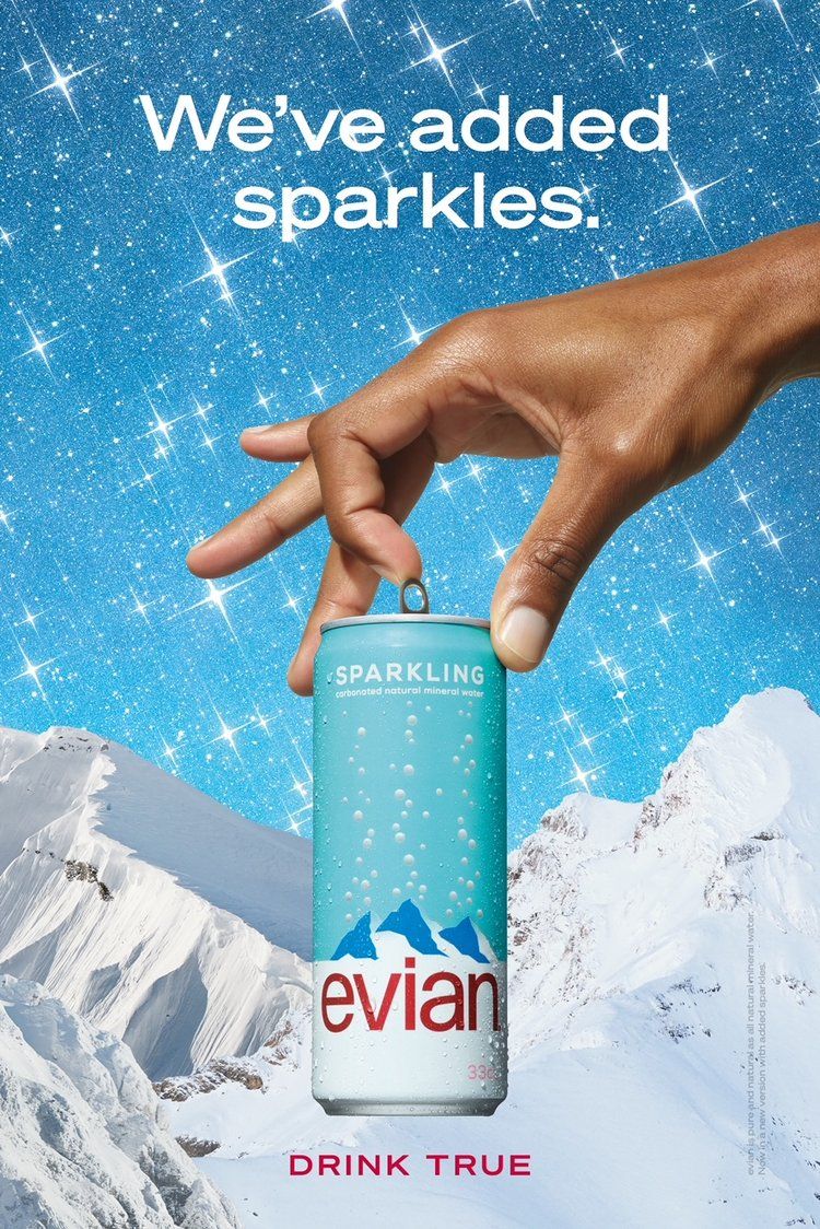 Poster: Hand dangling a sparkling water can by its tab over snowy mountains