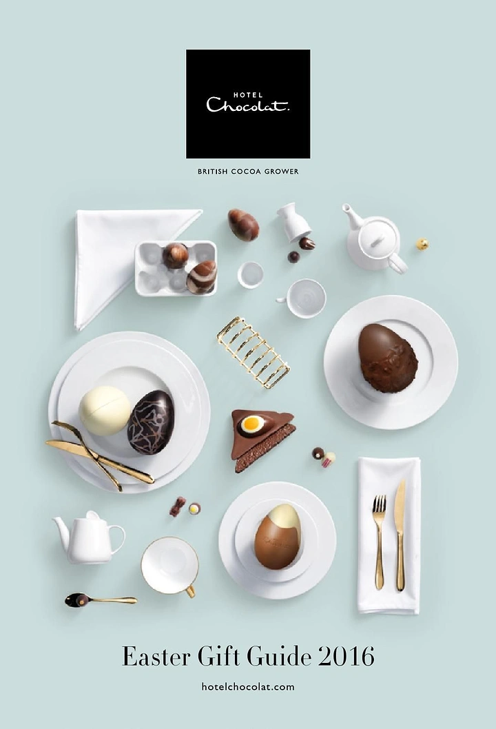 Easter creative ad: Flat-lay of chocolate eggs on white tableware