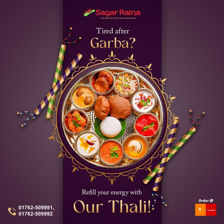 Overhead silver thali with puris and curries