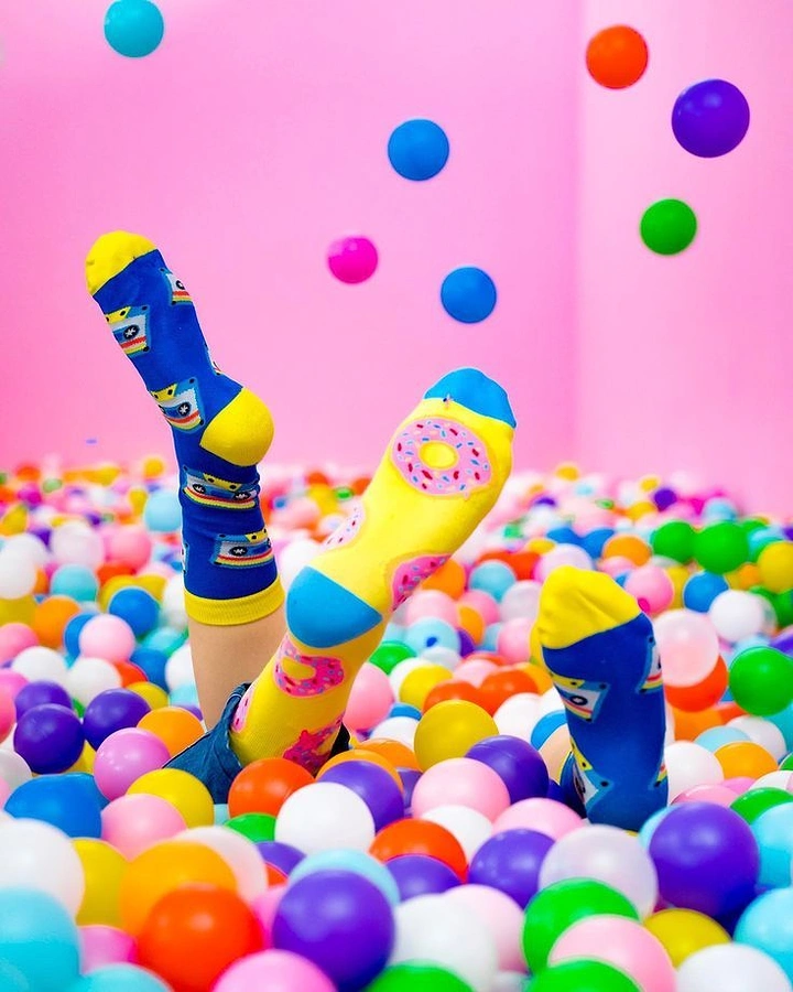 Socks Brands creative ad: Playful socks in ball-pit world