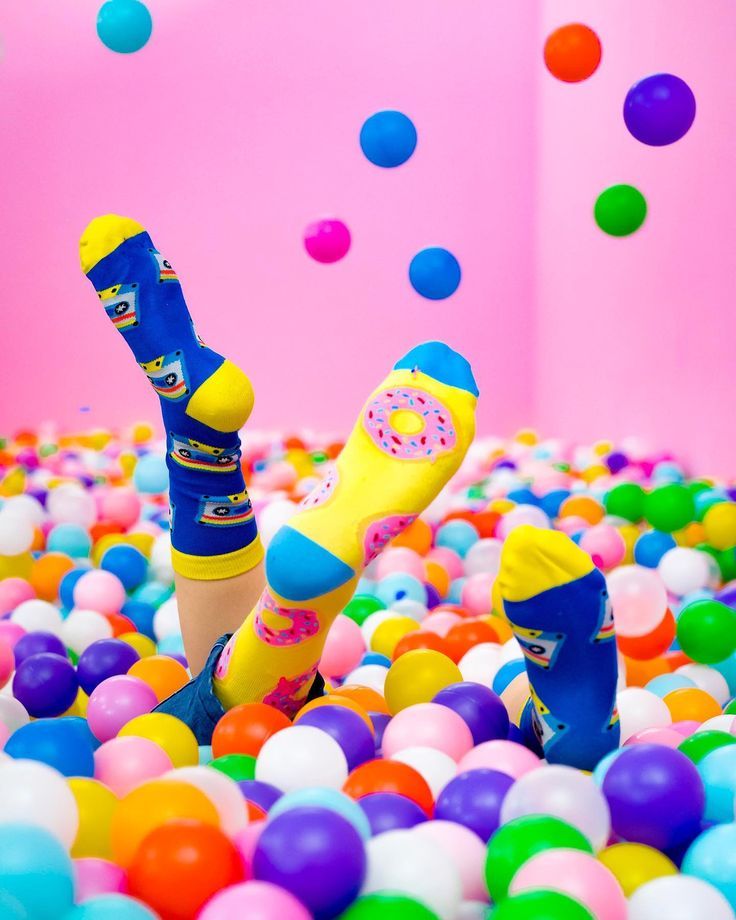 Instagram post: Playful socks in ball-pit world
