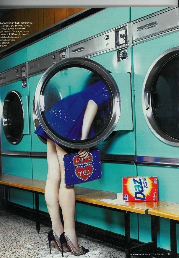 Laundry & Dry Cleaning creative ad: Woman diving headfirst into dryer, Daz
