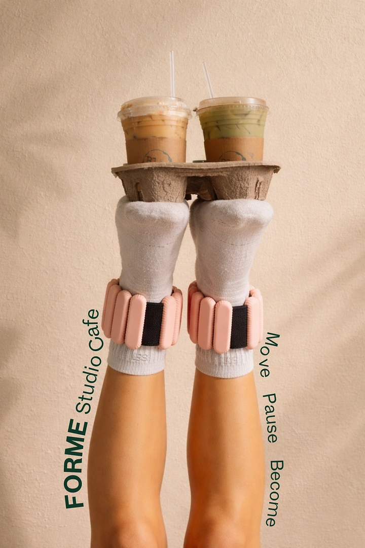 Pilates Studios creative ad: Legs holding coffees create playful studio concept