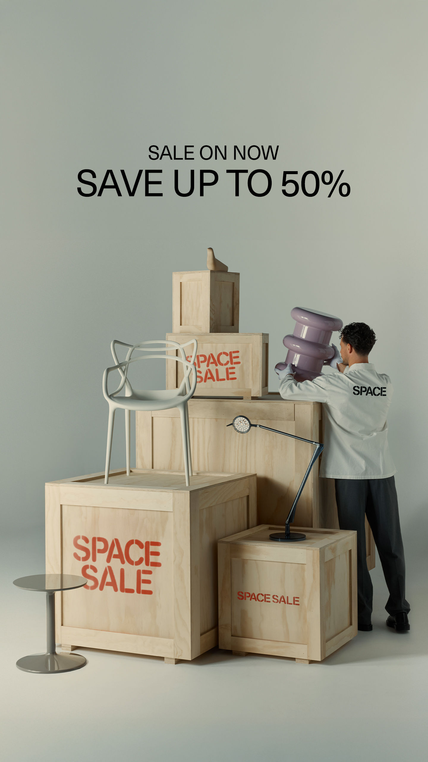 Story: Man stacking designer furniture on plywood crates