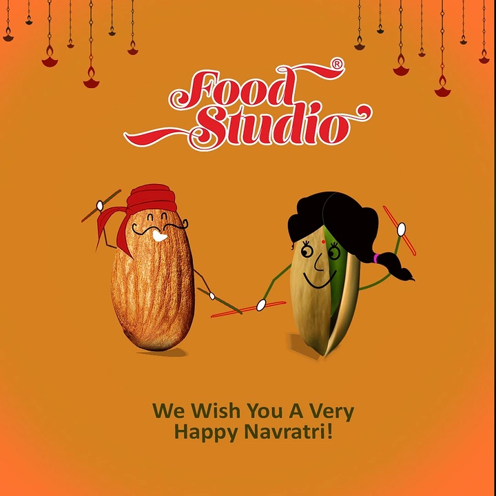Navratri creative ad: Almond and pistachio characters playing dandiya