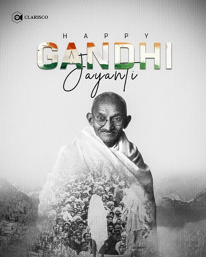 Gandhi Jayanti creative ad: Smiling Gandhi portrait with a double-exposed archival crowd inside his shawl