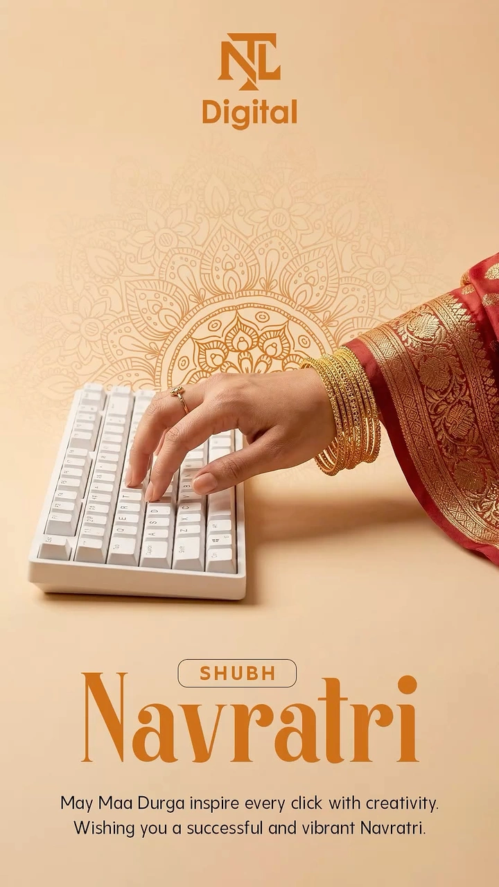 Navratri creative ad: Hand in bangles and saree typing on a white keyboard