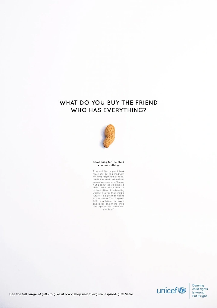 Christmas creative ad: Single peanut isolated on white