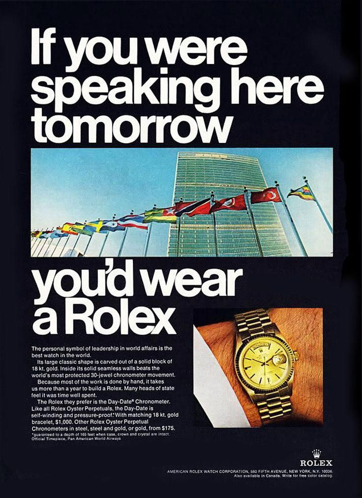 Poster: Gold Day-Date watch on a suited wrist, with the UN building and its flags