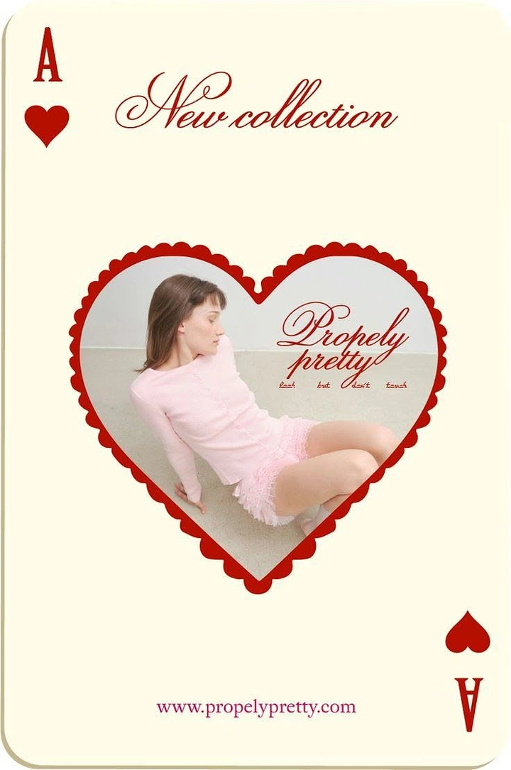 Valentine's Day creative ad: Model in pink knitwear inside a scalloped heart on an ace-of-hearts card