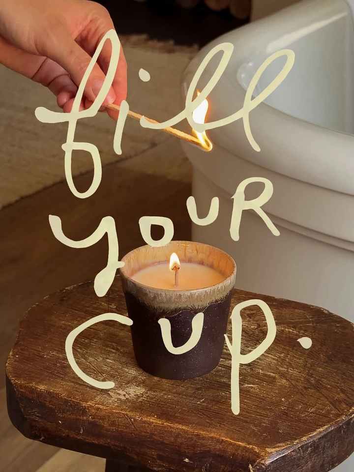 Candles & Home Fragrance creative ad: Hand-scrawled 'fill your cup' over candle