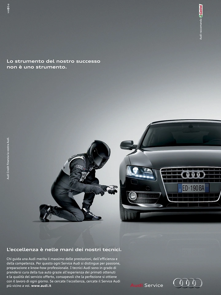 Auto Repair & Garages creative ad: Technician as helmeted racer before Audi