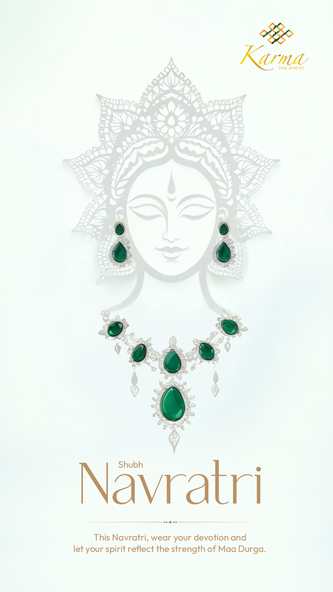 Paper-cut Durga face wearing a real emerald necklace and earrings