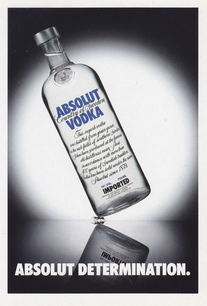 Creative ad: Tilted vodka bottle balanced on a tiny ant